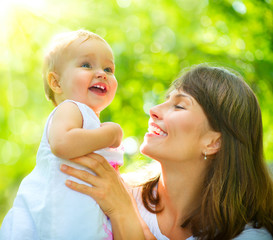 Fototapete - Beautiful Mother And Baby outdoors. Nature
