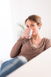 © W PRODUCTION - healthy young women drinking mineral water
