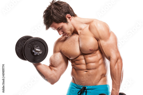 Muscular bodybuilder guy doing exercises with dumbbells over whi Plakat