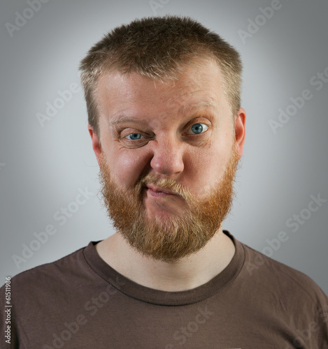 Fotografia, Obraz Man with an expression of discontent on his face