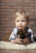 © natalinka29 - Child lovingly embraces his pet dog