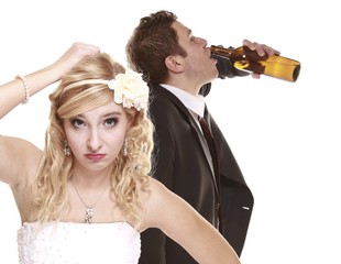 Wedding couple, unhappy bride with alcoholic groom