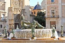 Turia Fountain On Plaza De La Virgen In Valencia, Spain