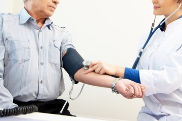 Wall Mural - Senior man at doctors's office appointment