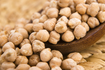 Sticker - dried white chickpeas ceci on the wooden spoon