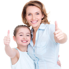 Wall Mural - Mother and young daughter with thumbs up