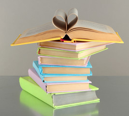 Sticker - Stack of books on grey background