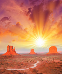 Sticker - The Monument Valley, Utah. Beautiful landscape at summer sunset