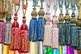 Fototapeta  - Colorful tassels for curtains, detail shot