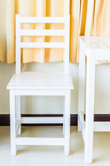 Canvas Print - White wood table and chair