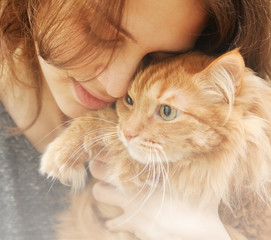 Wall Mural -  portrait of beautiful young woman 20 years with a fluffy red ca