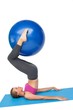 © WavebreakMediaMicro - Side view of a fit woman exercising with fitness ball