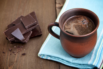 Coffee in a brown ceramic cup