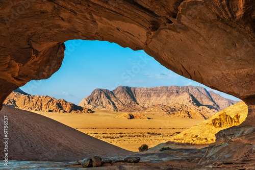 Naklejka - mata magnetyczna na lodówkę View through a rock arch in the desert of Wadi Rum