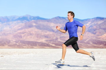 Wall Mural - Man running outdoor sprinting for success