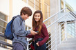 © Monkey Business - Two High School Students Standing Outside Building