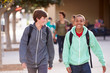 © Monkey Business - Two Male Students Walking To High School