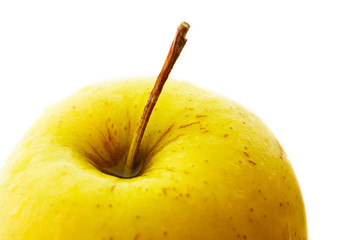 Macro shot of yellow juicy apple