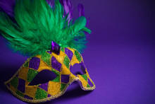 Mardi Gras Or Carnivale Mask On A Purple Background