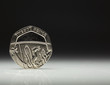 UK Currency Twenty Pence coin balancing on white