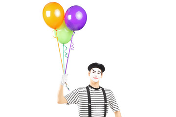 Sticker - Young mime artist holding balloons and looking at camera