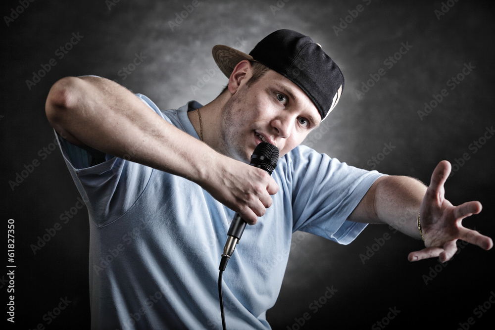 Rap singer man with microphone cool hand gesture - obrazy, fototapety, plakaty 