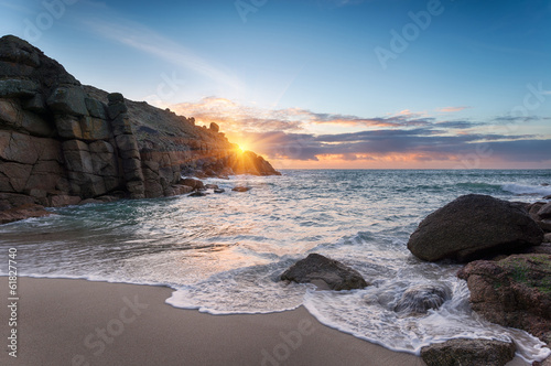 Fotomural Beautiful Sunrise over a sandy cove