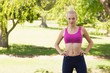 © WavebreakMediaMicro - Healthy and beautiful woman in sports bra in park