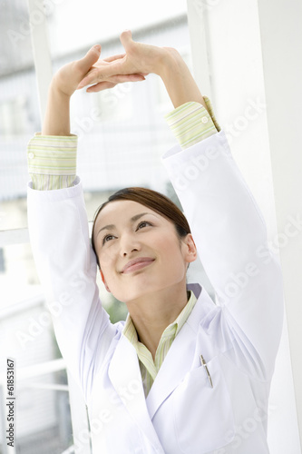 Cuadros en Lienzo female researcher doing stretch