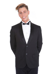 Wall Mural - Stylish young man smiling in tuxedo