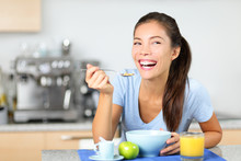 Woman Eating Breakfast Cereals