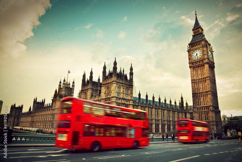 London, the UK. Red bus in motion and Big Ben - obrazy, fototapety, plakaty 