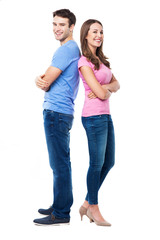 Poster - Young couple standing back to back