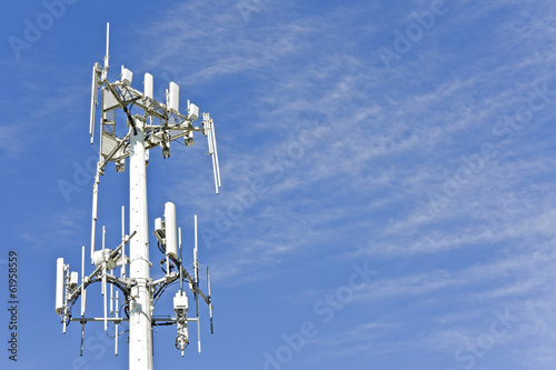 Fotografie, Tablou Cell phone telecommunication tower,blue sky,wispy clouds