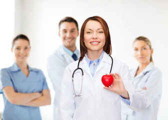 Sticker - smiling female doctor with heart and stethoscope