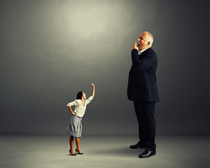 Poster - angry woman screaming at big yawning boss