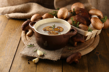 Wall Mural - Composition with mushroom soup in pot, fresh and dried