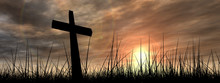 Black Cross In Grass At Sunset