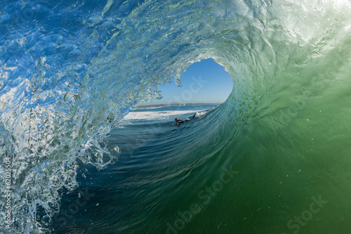 Fototapeta na wymiar Wave Hollow Tube Ride Surfer Angle