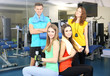 © Africa Studio - Group of people relaxing after training in gym