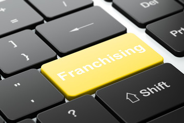 Business concept: Franchising on computer keyboard background