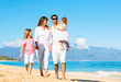 © EpicStockMedia - Happy Family on the Beach