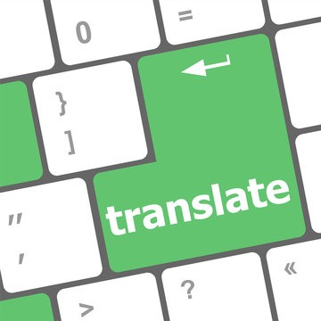 Multilingual translation on-line concept. Close up of multi language keyboard and translate word key