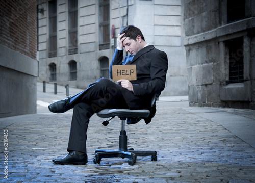 Fotografía Business Man sitting on Office Chair on Street in stress