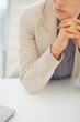 © Alliance - Closeup on concerned business woman sitting at desk
