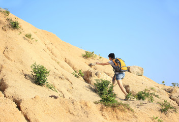 hiking woman walking on mountain trail