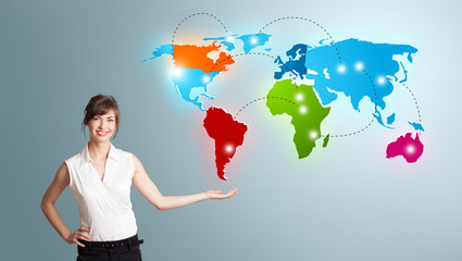 Young woman presenting colorful world map