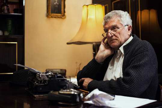Retro Senior Man writer thinking.