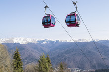 Two Empty Cable Cars Climbing