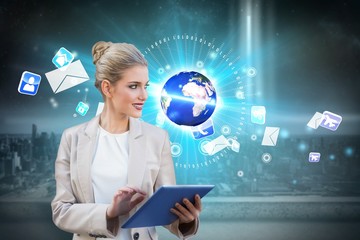 Poster - Blonde businesswoman using tablet pc with earth and emails